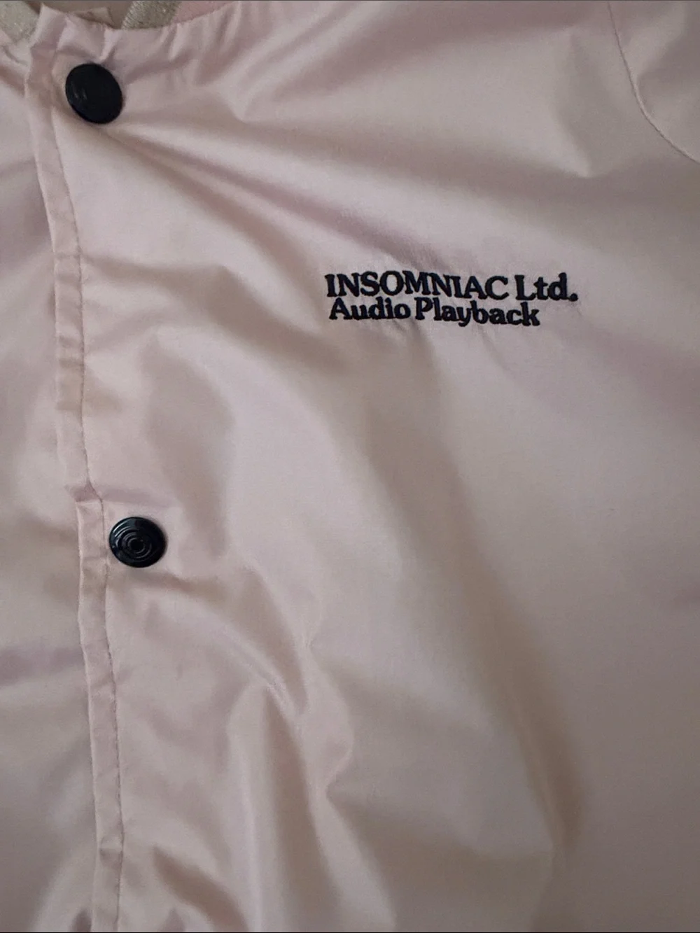Insomniac LTD Audio Playback Light Pink Bomber Jacket with Embroidered Logo